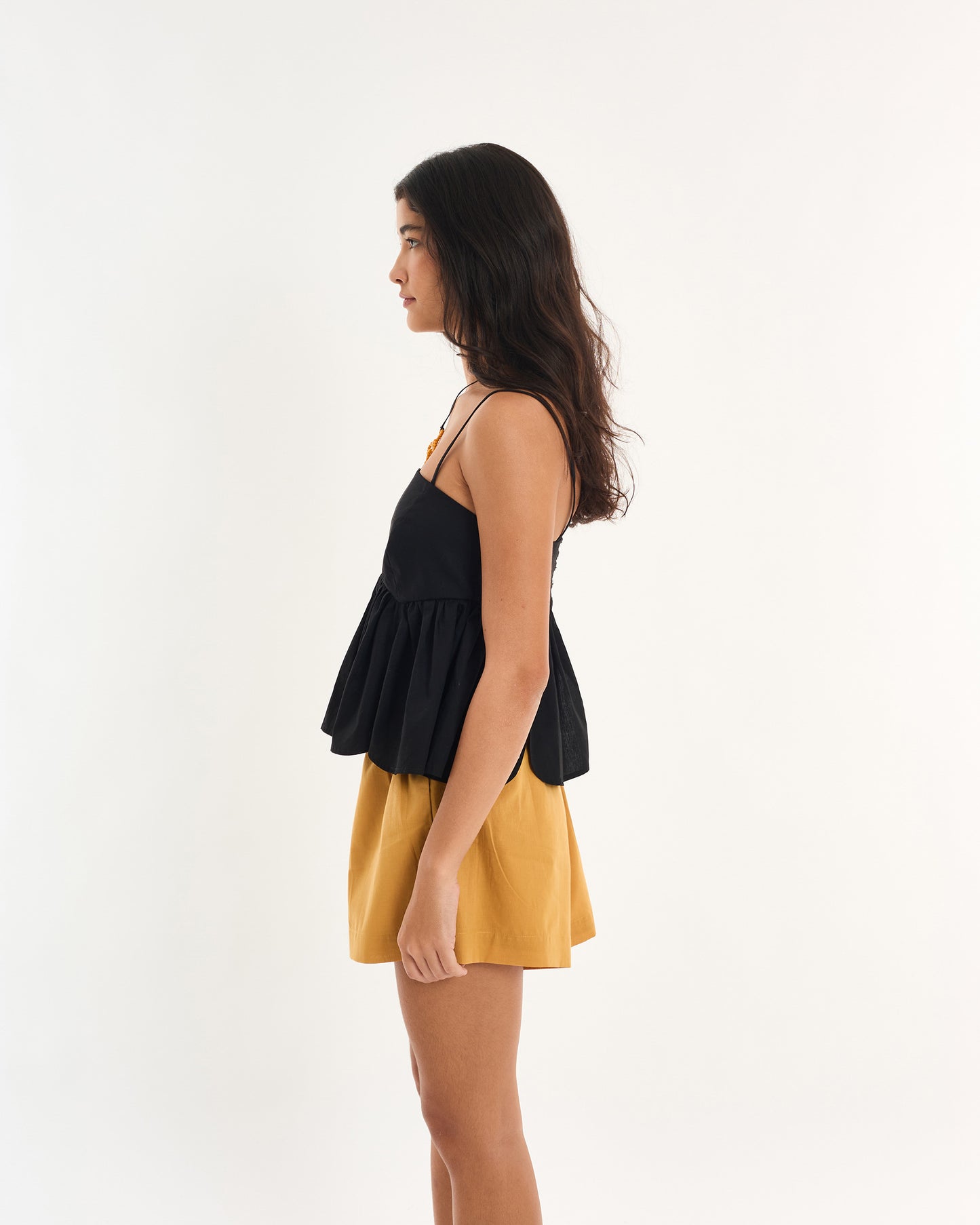 BLACK ALT RUFFLE BLOUSE
